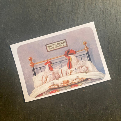 Vintage-style sticker with chickens on a bed 